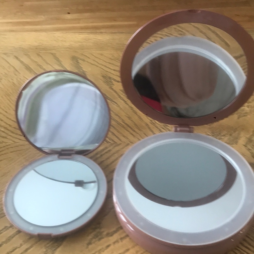 Two Magnifying Mirror